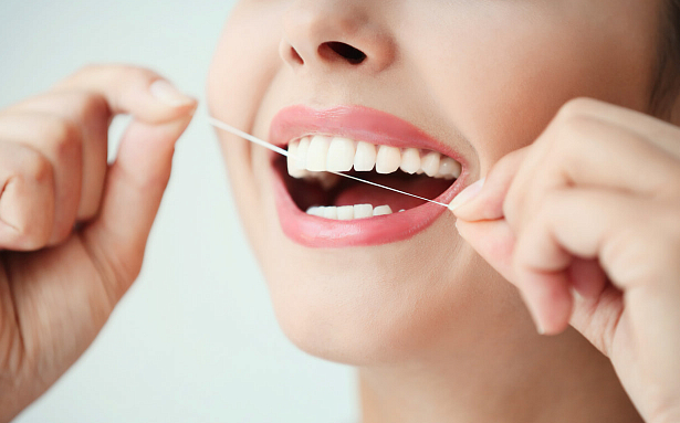 Уход за полостью рта после имплантации зуба